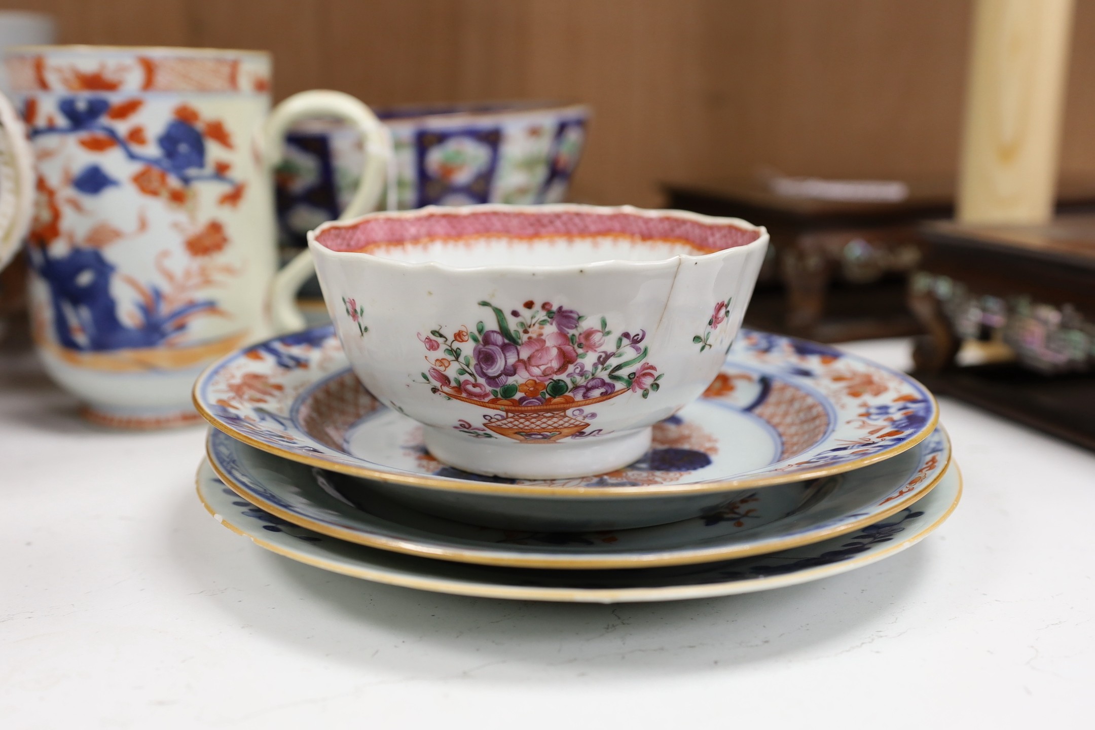 A large selection of 18th century Chinese export porcelain bowls, plates and mugs a/f